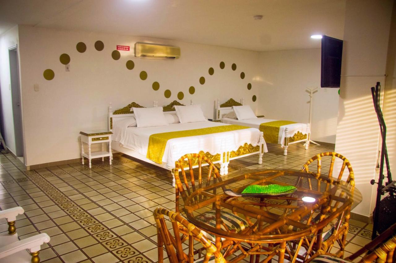 Hotel Mall Santana Del Rio La Dorada Exterior photo