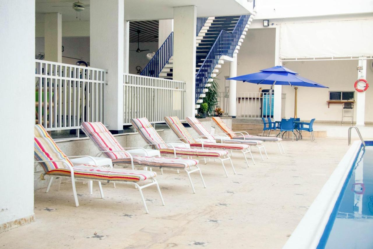 Hotel Mall Santana Del Rio La Dorada Exterior photo