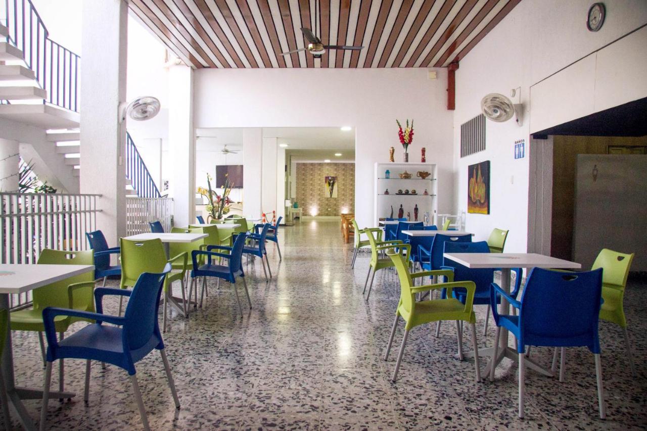 Hotel Mall Santana Del Rio La Dorada Exterior photo